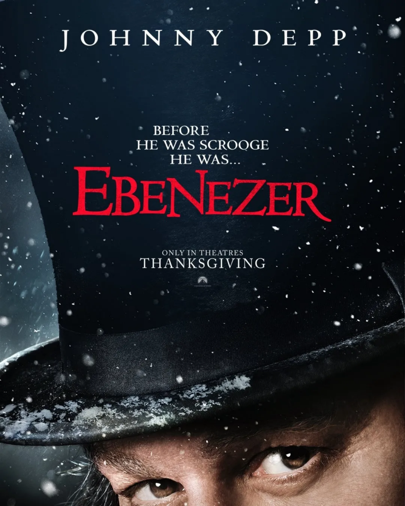 Cartell teaser de la pel·lícula EBENEZER, amb una imatge tancada sobre el barret de copa i la mirada a càmera del protagonista, nevant, representant a Evenizer Scrooge de Conte de Nadal. El claim diu "Abans de ser Scrooge, va ser Ebenezer". Protagonitzada per Johnny Depp.